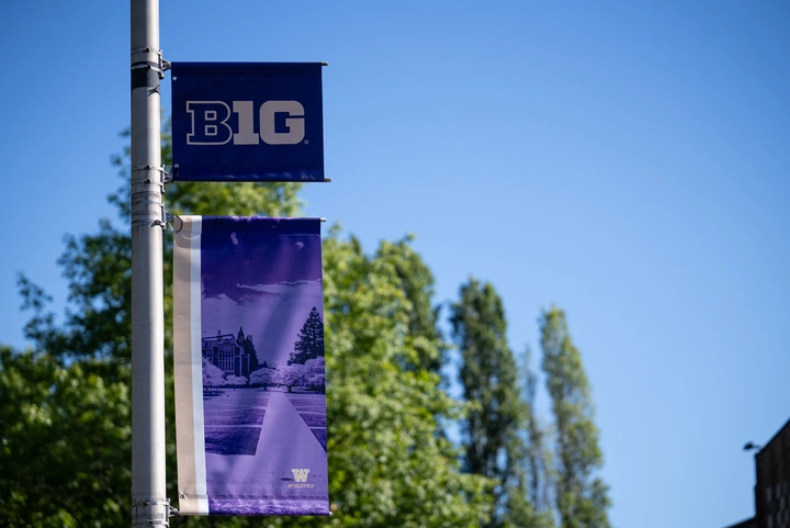 Big Ten street banner with a campus photo