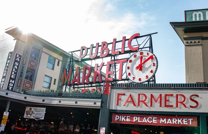 Public Market Center clock and Farmers sign