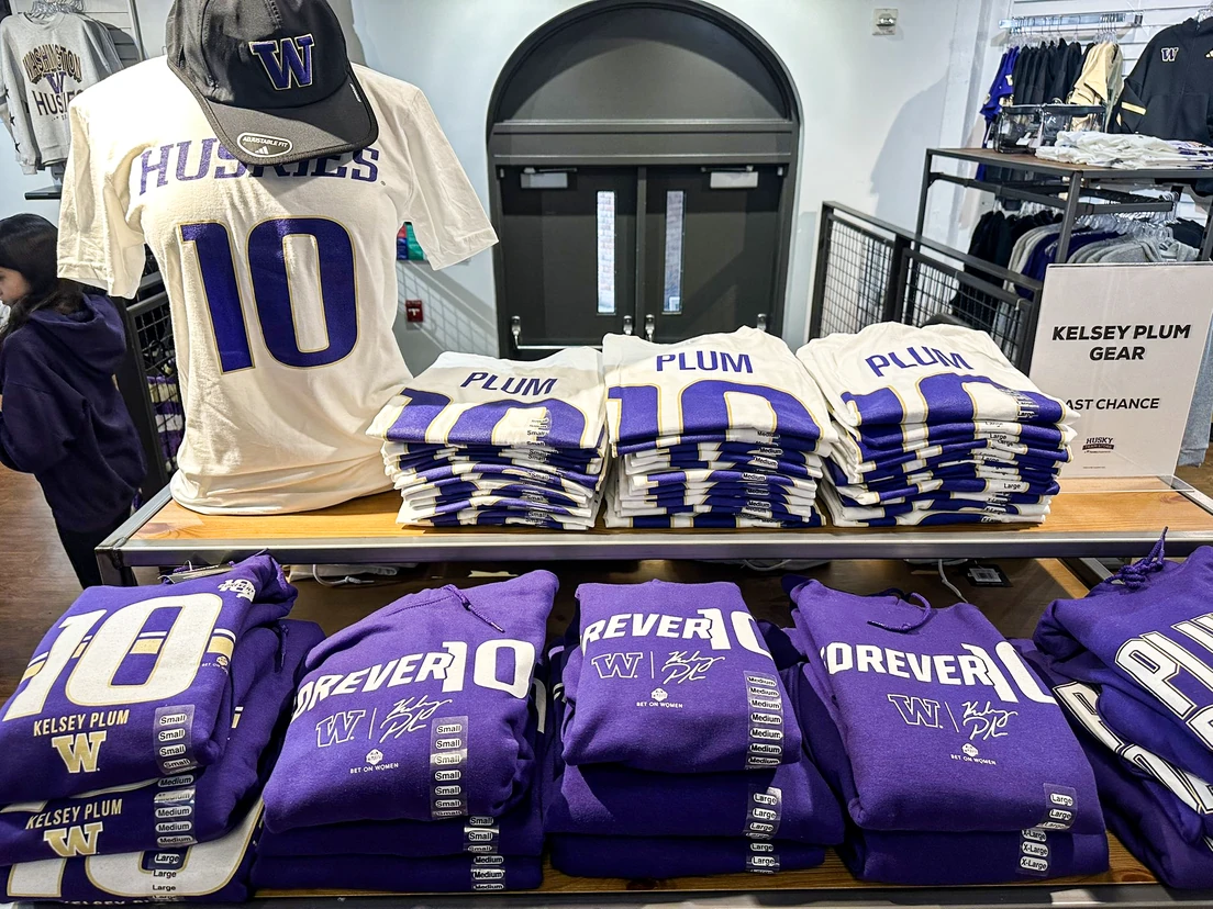 Kelsey Plum Forever 10 gear on display at the Huskies team store