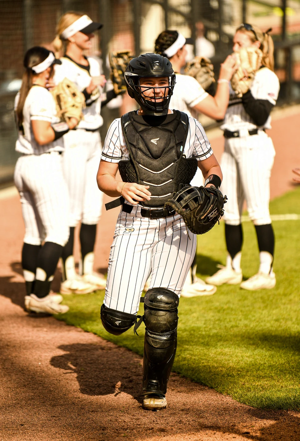 Purdue catcher walking on the field