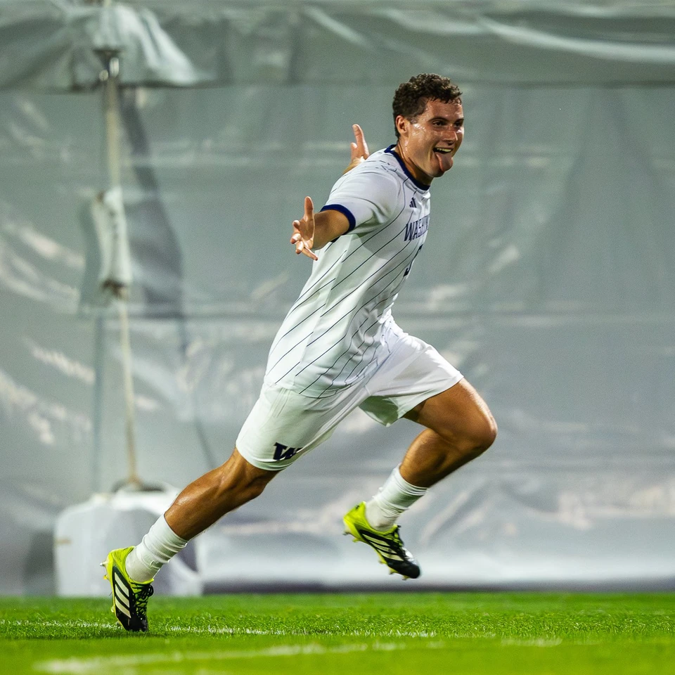 Washington men’s soccer player celebrating a goal