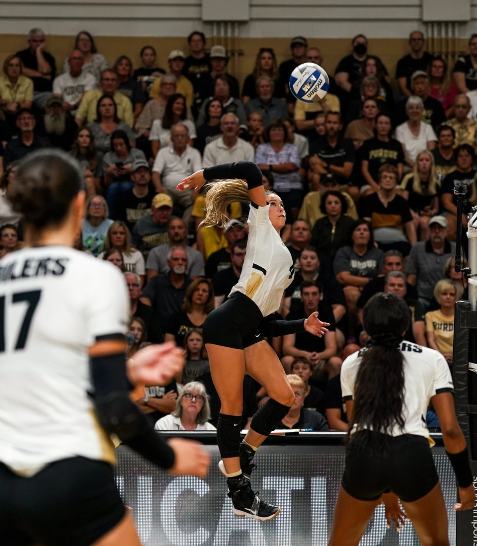 Purdue outside hitter attacking at the net