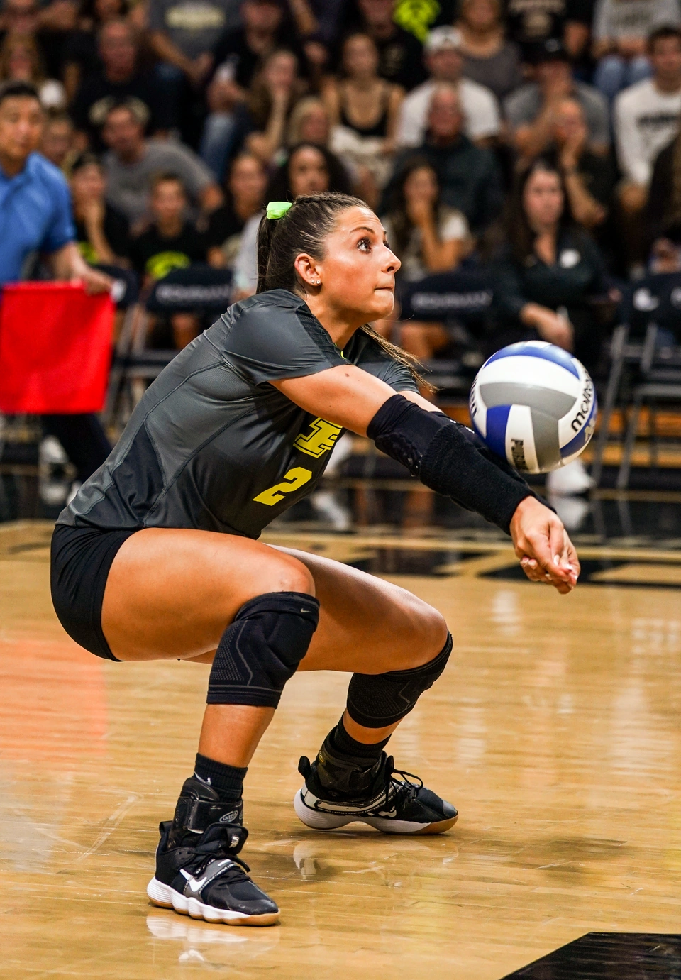 Purdue libero digging a ball